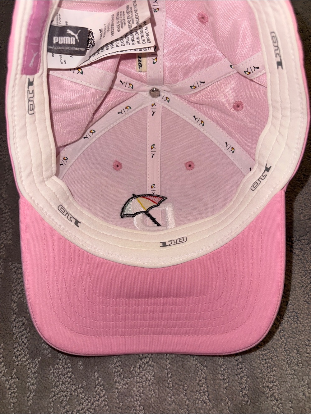 Puma pink golf hat with Arnold Palmer umbrella - Picture 5 of 6